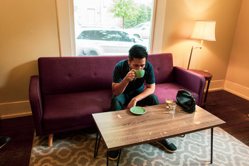 man drinking coffee in the morning