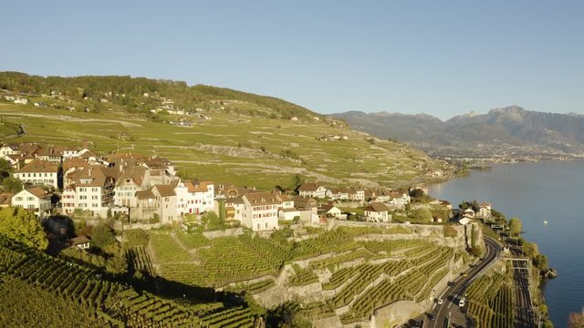 Flying in reverse, away from typical village (Rivaz) in Lavaux vineyard - Switzerland
CGN Belle-Epoque steam boat on Lake L&radic;&copy;man, autumn colors and sunset light
