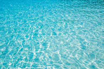 Blue marine pool or sea wave ripple curl water surface texture. Summer holiday relax background with copy space.