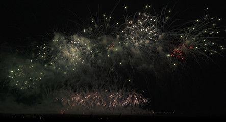 Colorful fireworks on the black sky background