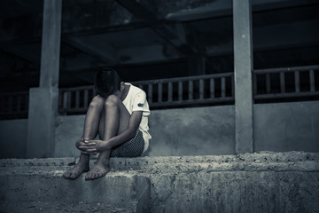Family Violence, Alone and scare  child boy, Human trafficking concept.