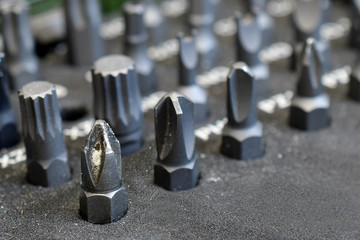 Used screwdriver bits. Close up image with copy space.