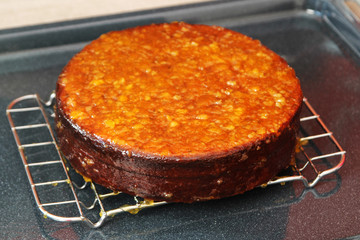 Marmalade layering on a cake to make icing of traditional cake