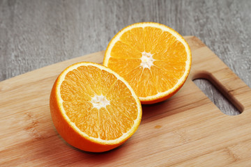 An orange cut into two halves