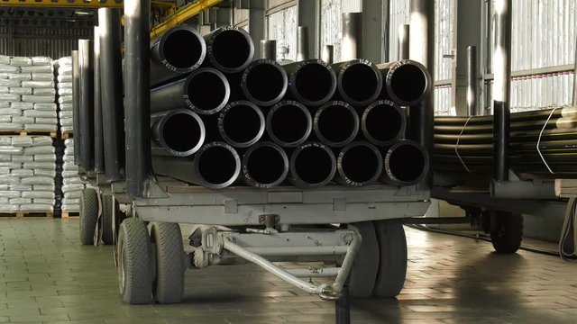 Production of polyethylene pipes. The finished pipes. 2 shots.