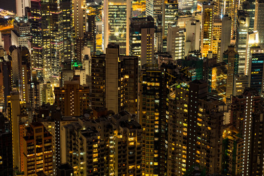 Hong Kong City at night. Close up view of skyscrapers and city lights, skyline