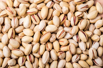 Pistachios nuts background. Pistachio texture. Top view