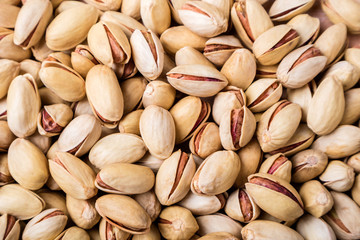 Pistachios nuts background. Pistachio texture. Top view