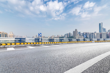 Panoramic skyline and modern business office buildings with empty road,empty concrete square floor