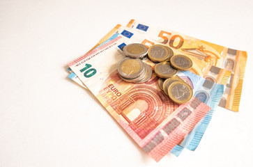 Obraz na płótnie Canvas euro money and coins are on the table