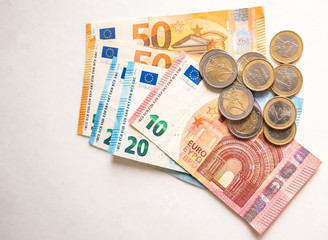 euro  money and coins are on the table
