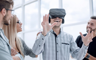 Man in glasses VR at the office