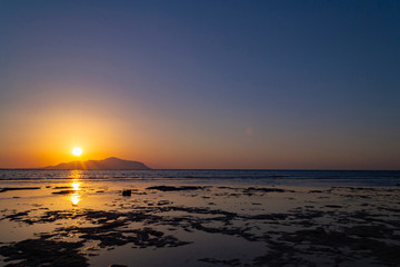 Wonderful sunset over Tiran island. Red sea, Saudi Arabia
