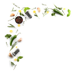 Flat lay composition with spices and herbs on white background