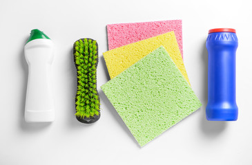 Cleaning supplies on white background