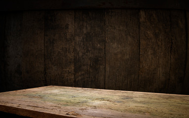 background of barrel and worn old table of wood