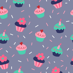 Cute seamless pattern with cupcakes on gray background