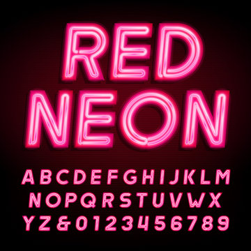 Red neon tube alphabet font. Neon color letters and numbers on a dark background. Vector typeface for your design.