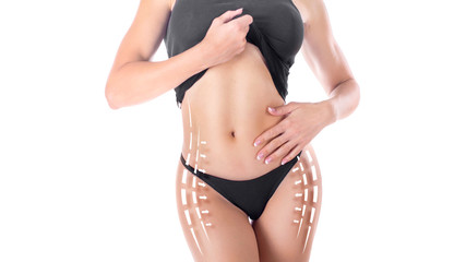 Female body with the drawing arrows on it. Fat lose, liposuction and cellulite removal concept
