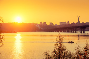 Fototapeta premium Skyline, Kiev city in the evening. Right bank of the Dnieper River