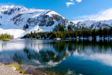 Snowcapped mountain with blue sky reflecting in the Alta Lake, Alta Lake Scenic Alpine Mountain Landscape