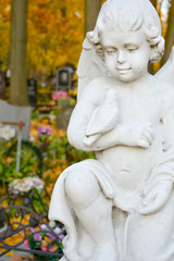 Fototapeta premium White Stone Sculpture of Guardian Little Angel