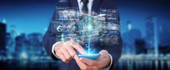 Businessman using wireframe holographic 3D digital projection of an engine