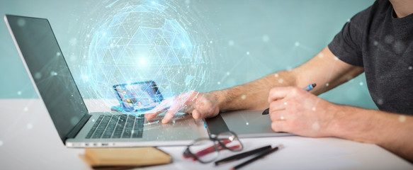 Graphic designer using digital triangle exploding sphere hologram 3D rendering