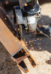 Sparks from cutting metal on the rack