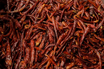 Dried red hot chilli peppers.