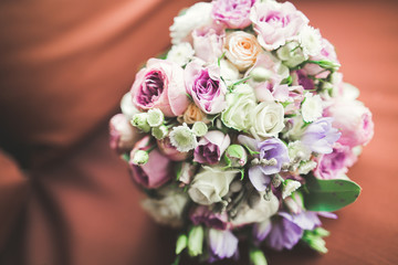 Wonderful luxury wedding bouquet of different flowers