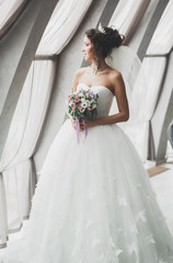 Beautiful luxury bride in elegant white dress