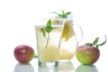 summer sweet cold compote of fresh apples with a sprig of mint