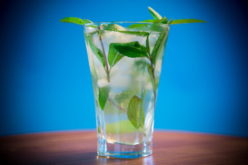 summer sweet cold compote of fresh apples with a sprig of mint