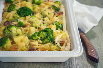 Pie with potatoes, broccoli and bacon.