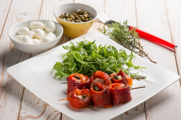 capsicum stuffed with mozzarella and capers with arugula salad