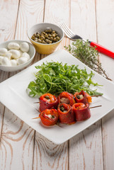 capsicum stuffed with mozzarella and capers with arugula salad