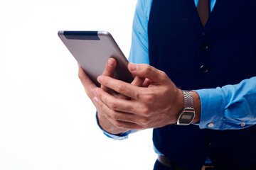 tablet in the hands of a man