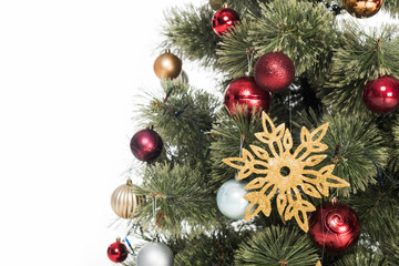 Obraz na płótnie Canvas close up view of decorative toys on christmas tree isolated on white
