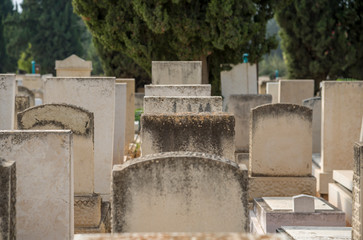 Stone graves in a cemetery