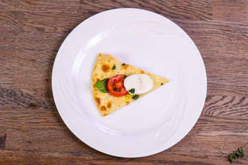 Pizza Caprese with basil