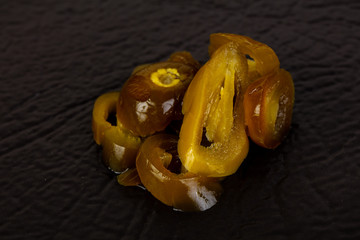 Sliced pickled jalapeno topping