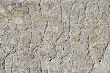 surface of an old wall with cement plaster grunge background texture