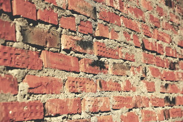surface of an old red brick wall grunge background texture