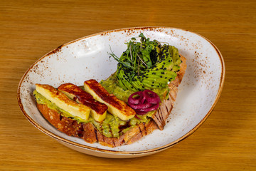 Bruschetta with avocado and haloumi
