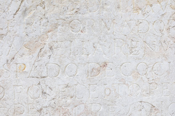 Background with old inscription on the stone