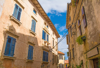 Fototapeta na wymiar Buildings in the hill village of Groznjan (also called Grisignana) in Istria, Croatia 