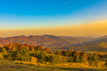 Naklejka na ściany i meble Colorful autumn landscape. Carpathian mountains, Romania, Europe.