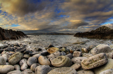 Fototapeta na wymiar Seascape with beach of stones