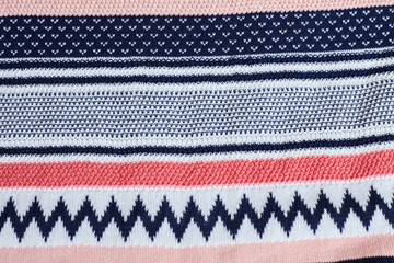 Texture of warm knitted winter clothes.